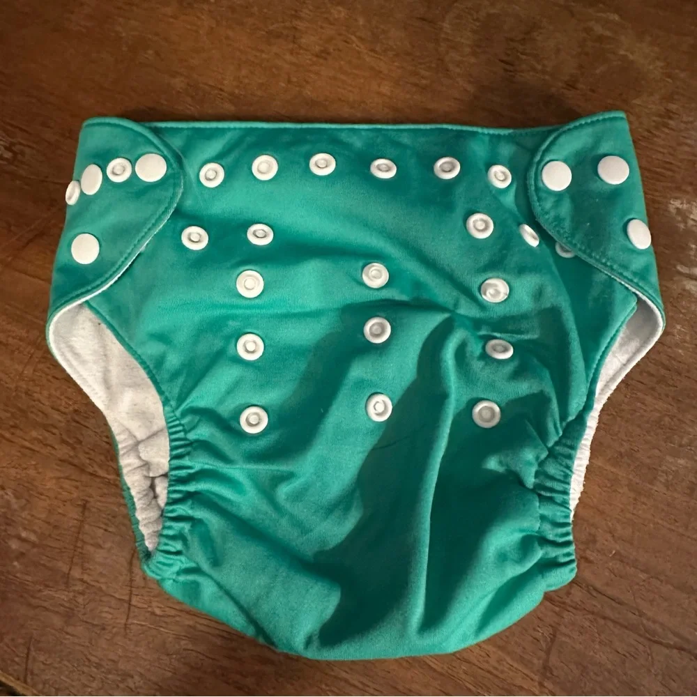 Nora’s Nursery Nautical Reusable Pocket Cloth Diaper Set of 4 adjustable size.